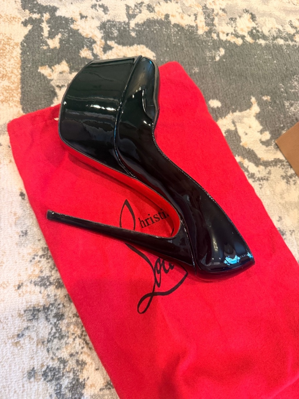 Patent leather Christian Louboutin red bottom pumps